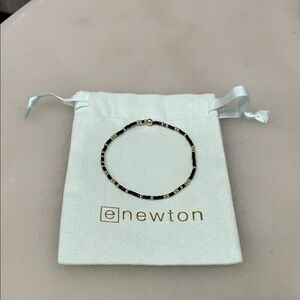 Elegant Newton Black and Gold Bracelet